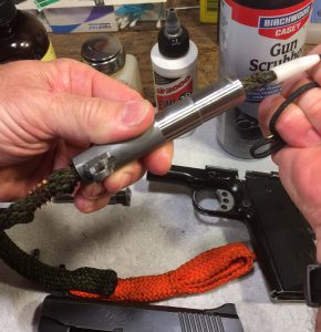 Using Hoppes Boresnake to clean a Kimber 1911 barrel