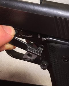 Inserting the slide lock lever Kimber 1911