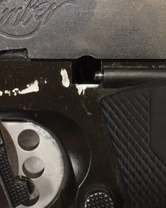 Slide lock lever inserted into slide Kimber 1911