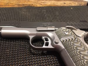 How to Disassemble a Kimber 1911-Push Slide Stop Lever from the other side until it Starts coming Up