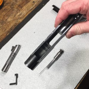 Remove guide rod and barrel from the slide