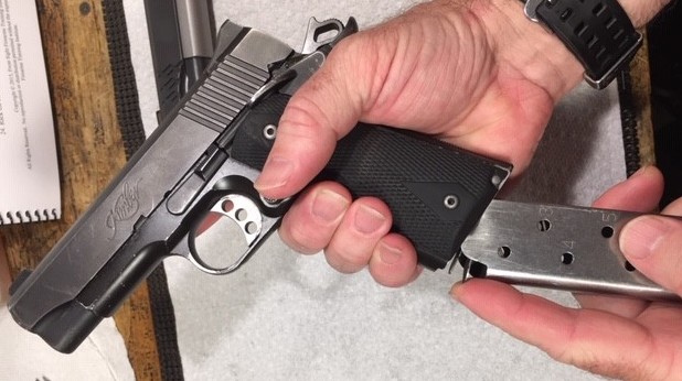 1911 Function and Safety Check-Insert an empty magazine in the mag well