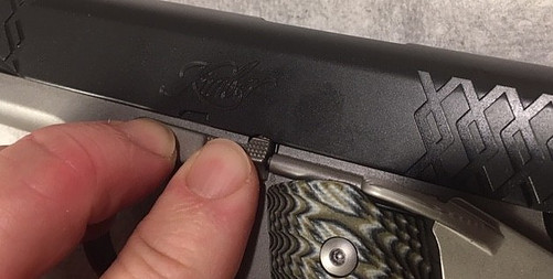 How to Reassemble a 1911-Press the Slide Stop Into the Frame with Even Pressure