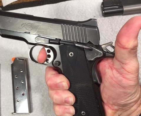 1911 Function and Safety Check-Press trigger with grip safety released and hammer must not fall
