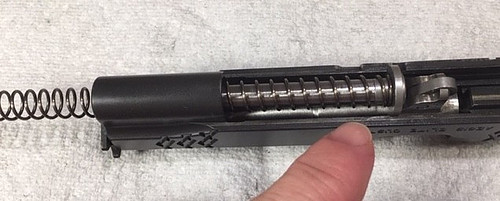 How to Reassemble a 1911-Slide the Closed End of the Recoil Spring onto the Guide Rod
