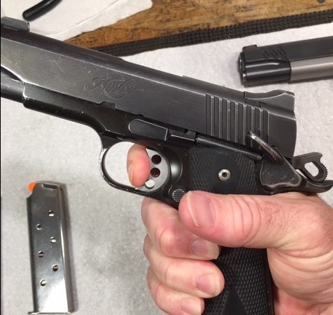1911 Function and Safety Check-With thumb safety on press trigger and hammer should stay cocked