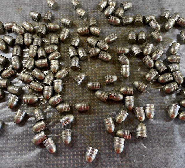 Spread Lubed Bullets on Wax paper to dry