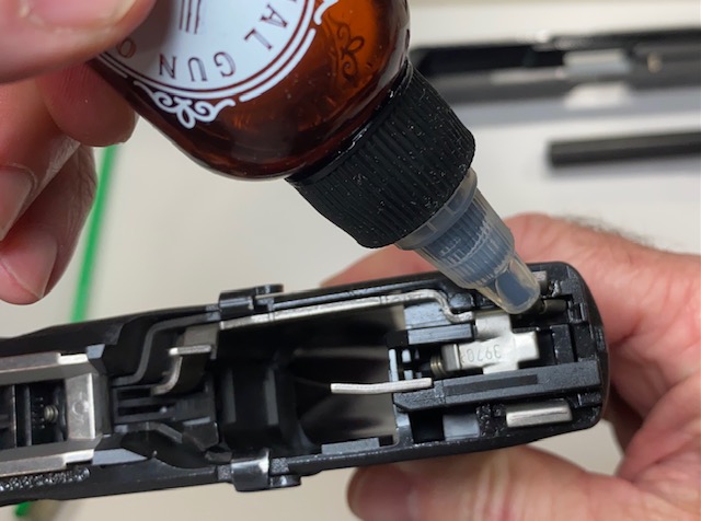 How to Field Strip & Clean a Glock 17 9mm or Glock 19 9mm Pistol: Apply ONE drop of oil in the frame where the trigger bar touches the connector as shown