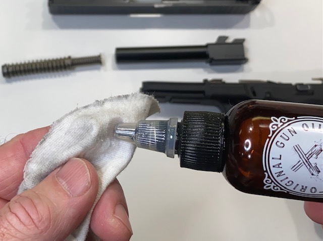 How to Field Strip & Clean a Glock 17 9mm or Glock 19 9mm Pistol: Apply a drop or two of Original Gun Oil to a cotton cloth