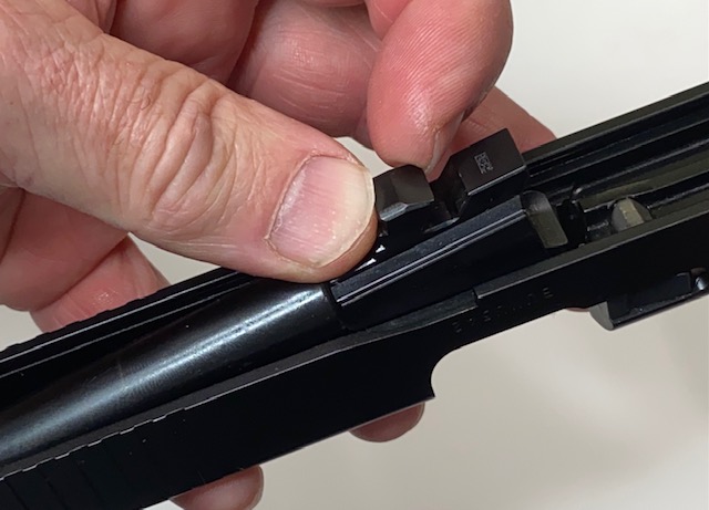 How to Field Strip & Clean a Glock 17 9mm or Glock 19 9mm Pistol: Place the barrel into the slide