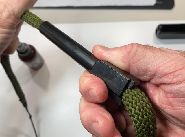 How to Field Strip & Clean a Glock 17 9mm or Glock 19 9mm Pistol: Run a Boresnake through the barrel several times
