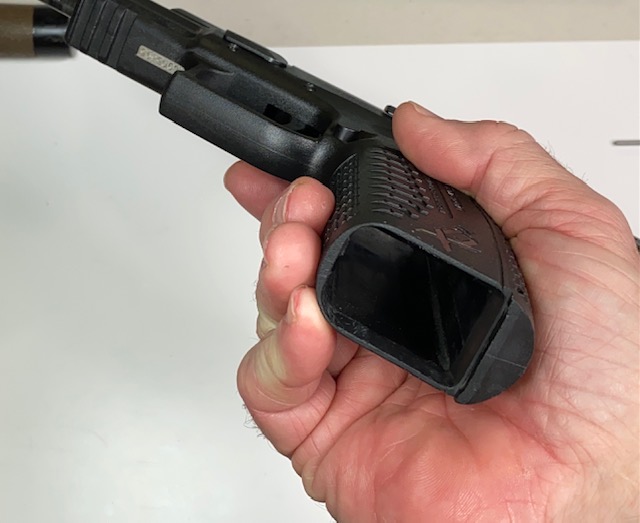 Unload the XDm by removing the magazine and clearing the chamber
