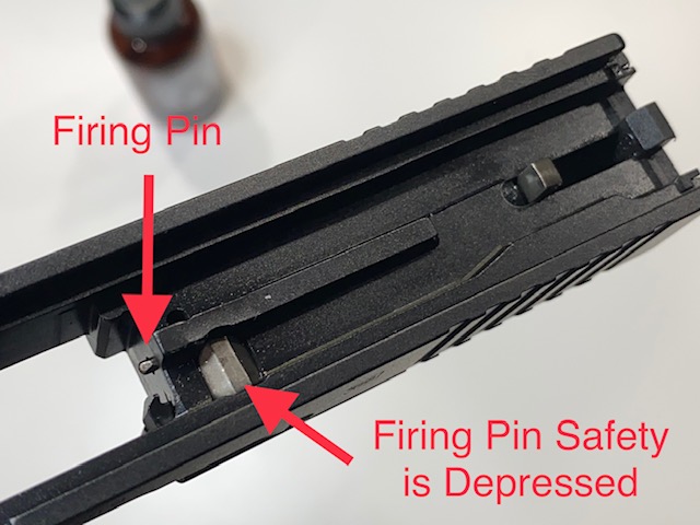When Firing Pin Safety is depressed, the firing pin should protrude when the Firing Pin Lug is pushed forward