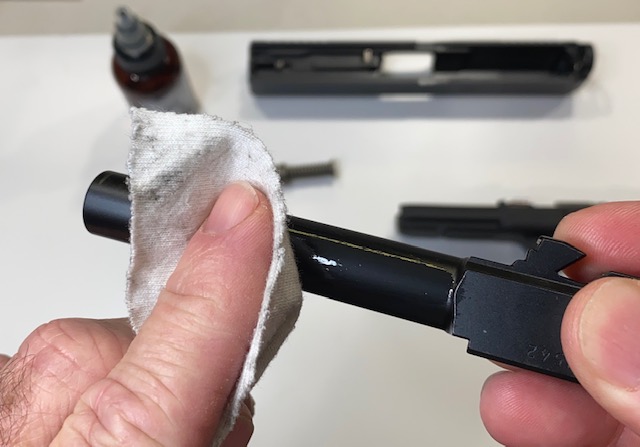 How to Field Strip & Clean a Glock 17 9mm or Glock 19 9mm Pistol: Wipe down all surfaces on the outside of the barrel with the oil, leaving a light film