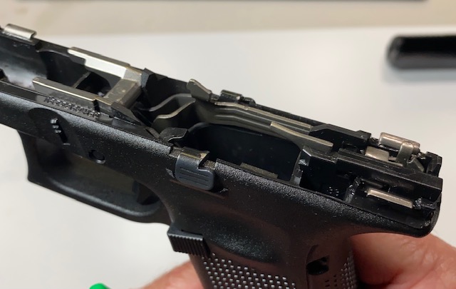 How to Field Strip & Clean a Glock 17 9mm or Glock 19 9mm Pistol: Wipe until the frame is pretty clean