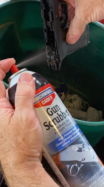 Use Birchwood Synthetic Safe Gun Scrubber to clean the Frame.