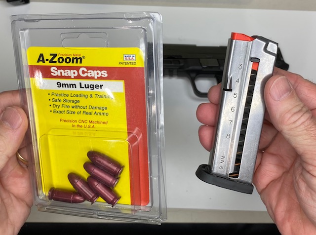 Load 5 dummy rounds into a magazine