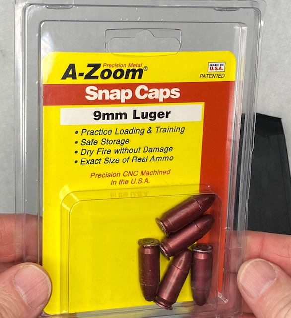 Load the magazine with dummy rounds or snap caps