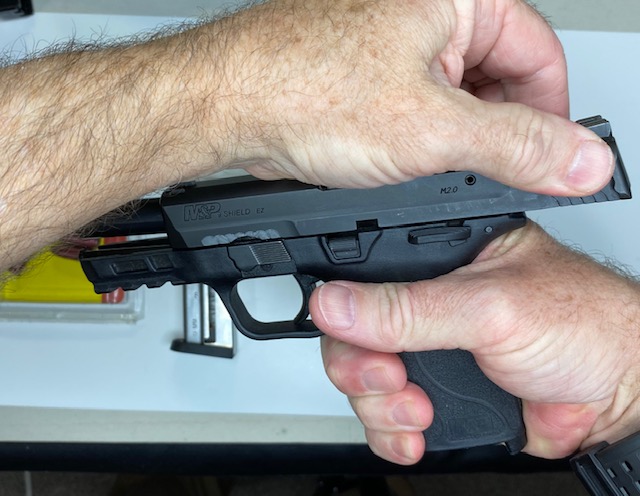 Rack the slide to reset, point the gun in a safe direction and press the trigger again.