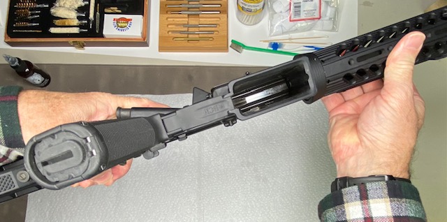 How to Disassemble & Clean An AR-15 Rifle: Verify there is no magazine in the rifle