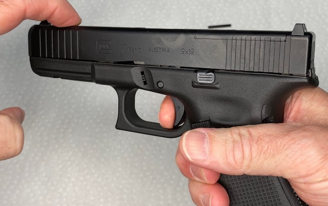How to Install or How to Change a Glock Backstrap: Point the UNLOADED Glock in a SAFE direction and Press the Trigger