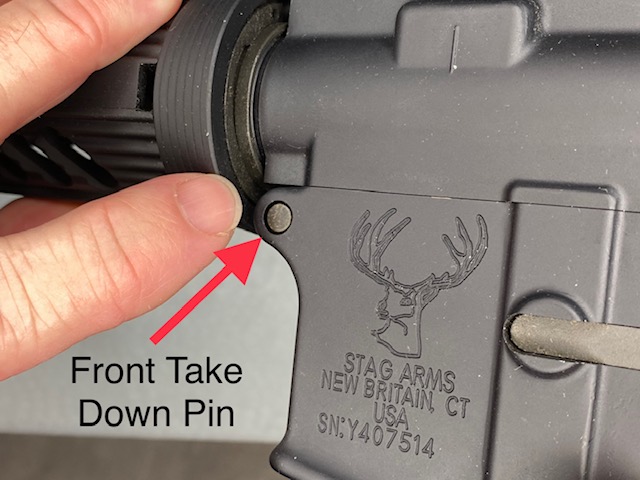 Press on the Front Take Down Pin