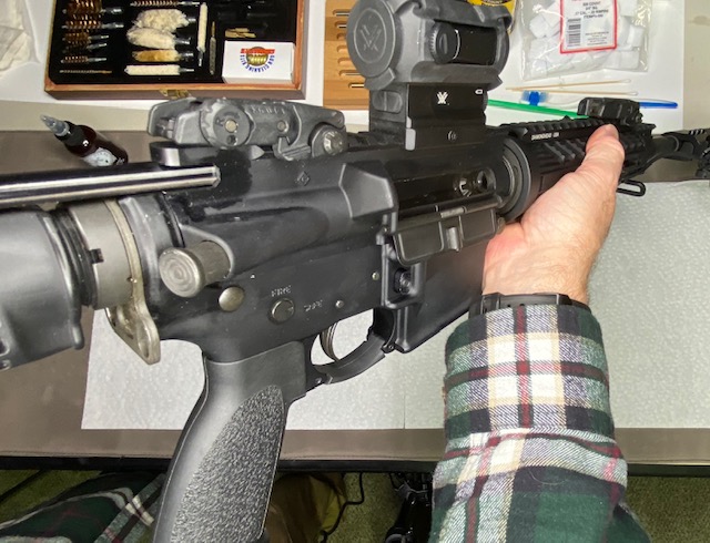 Pull back Charging Handle an verify there is not a round in the chamber.