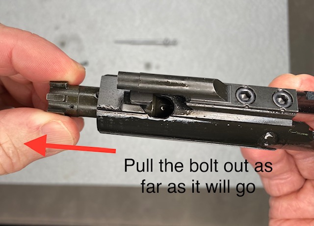 Pull the Bolt out as far as it goes, this will properly align the Cam Pin so the BCG will go into the upper