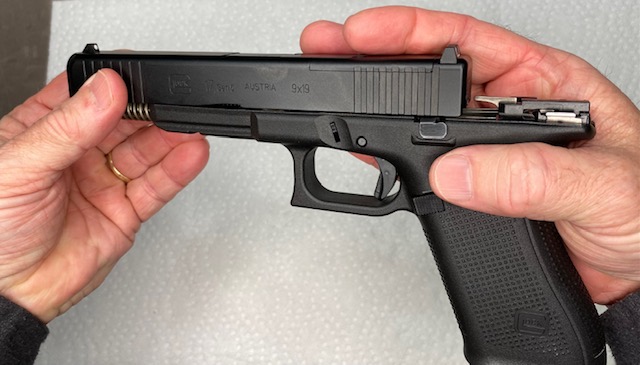 How to Install or How to Change a Glock Backstrap: Remove the slide off the front of the frame