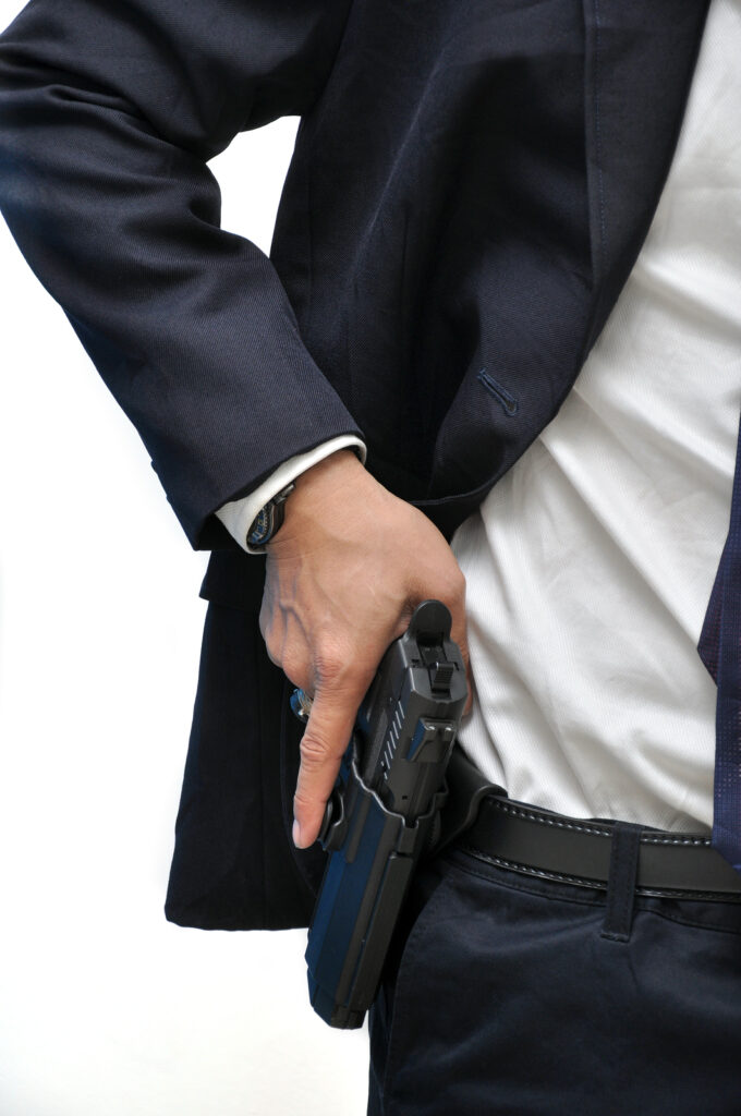 Which states have concealed carry laws: man carrying a concealed gun