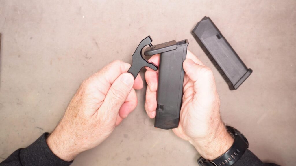 Using a Glock magazine disassembly tool
