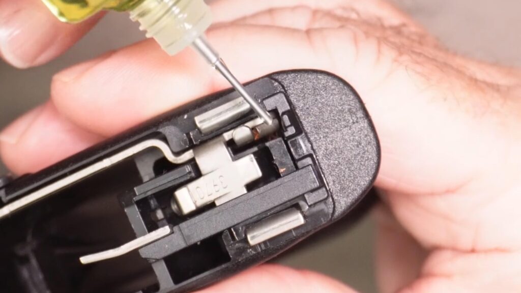 One small drop of oil where trigger bar contacts the connector