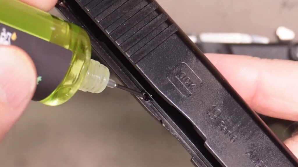 Apply one drop of oil in each slide cut and spread it the length of the slide